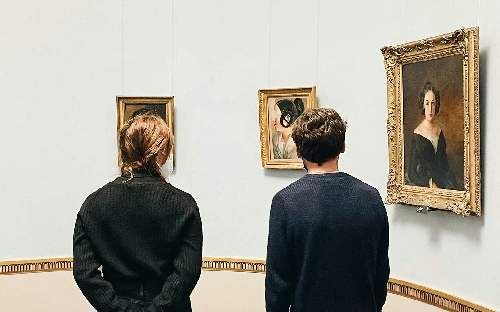 Visitors viewing paintings at Alte Nationalgalerie, Berlin.
