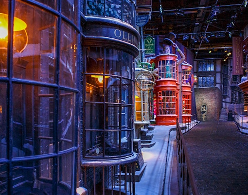 Hogwarts Great Hall adorned with Christmas decorations during Harry Potter Warner Bros. Studio Tour, London.