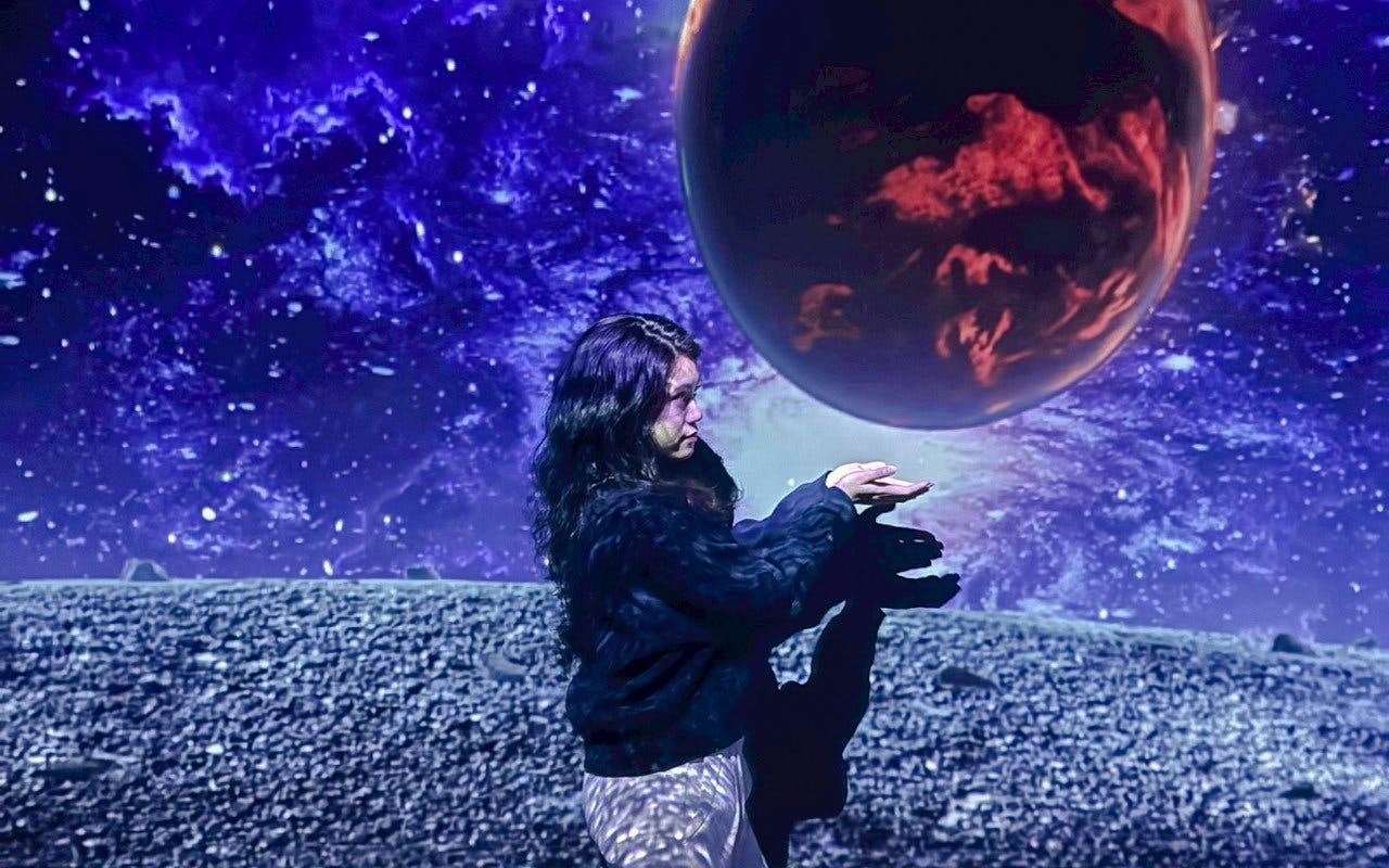 Interactive space-themed display at MIRACLEWORLD Osaka.