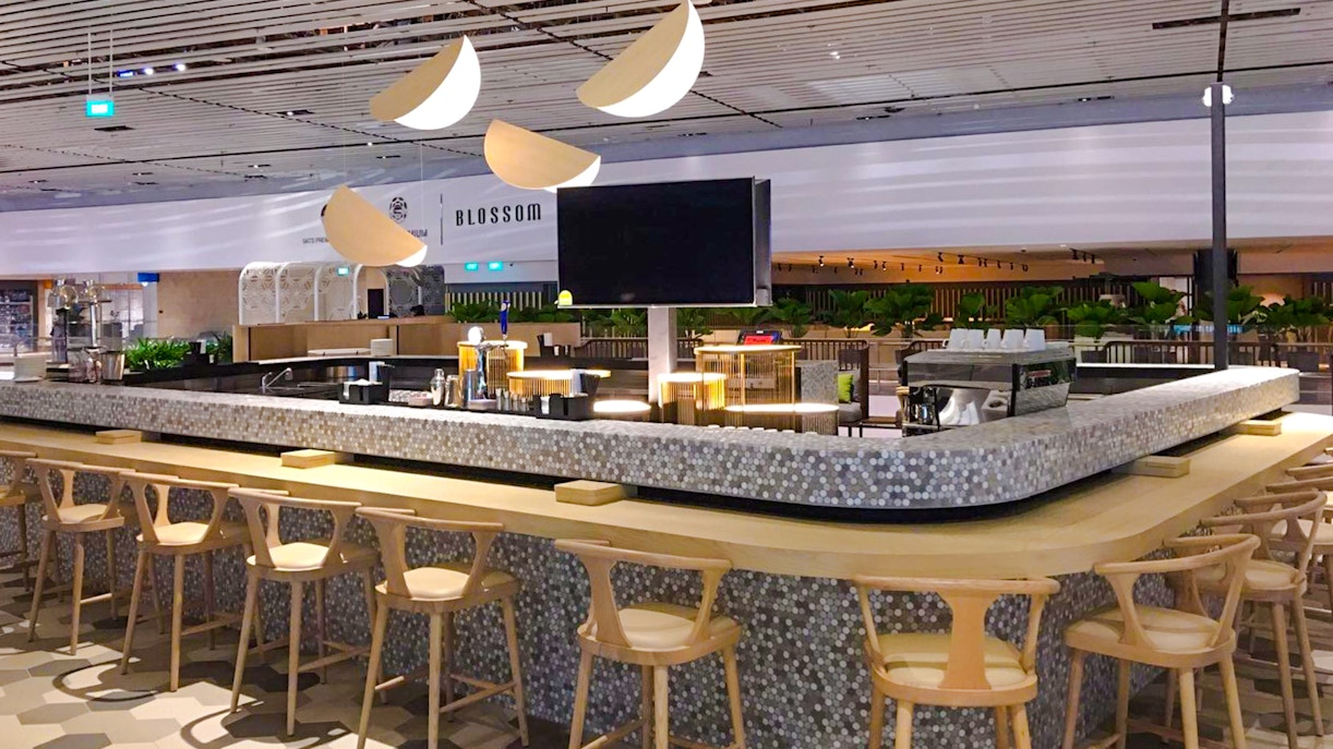 Bar area at BLOSSOM by SATS, Plaza Premium Lounge, Singapore Changi Airport.