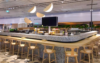 Bar area at BLOSSOM by SATS, Plaza Premium Lounge, Singapore Changi Airport.