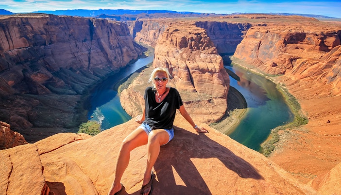 Secret Antelope Canyon rock formations with sunlight filtering through, part of Horseshoe Bend tour.
