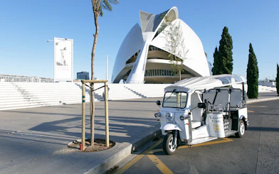 Tuk Tuk parked near Valencia's City of Arts and Sciences.