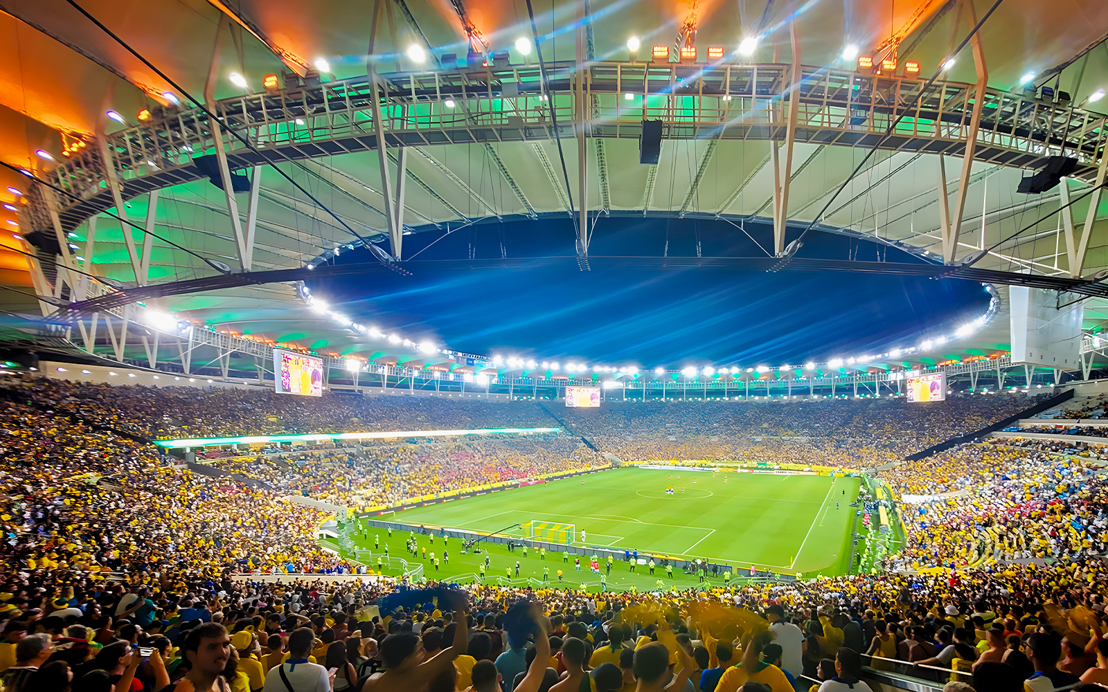 Spectators watching a football match at Maracanã Stadium, Rio de Janeiro, Brazil.