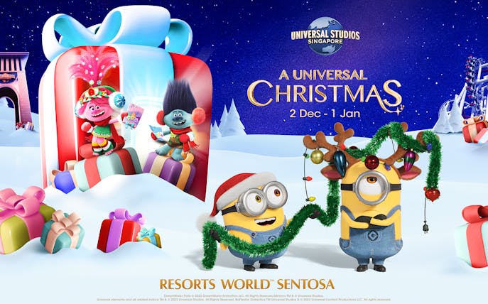 Minions and Trolls celebrating Christmas at Universal Studios Singapore with festive decorations.
