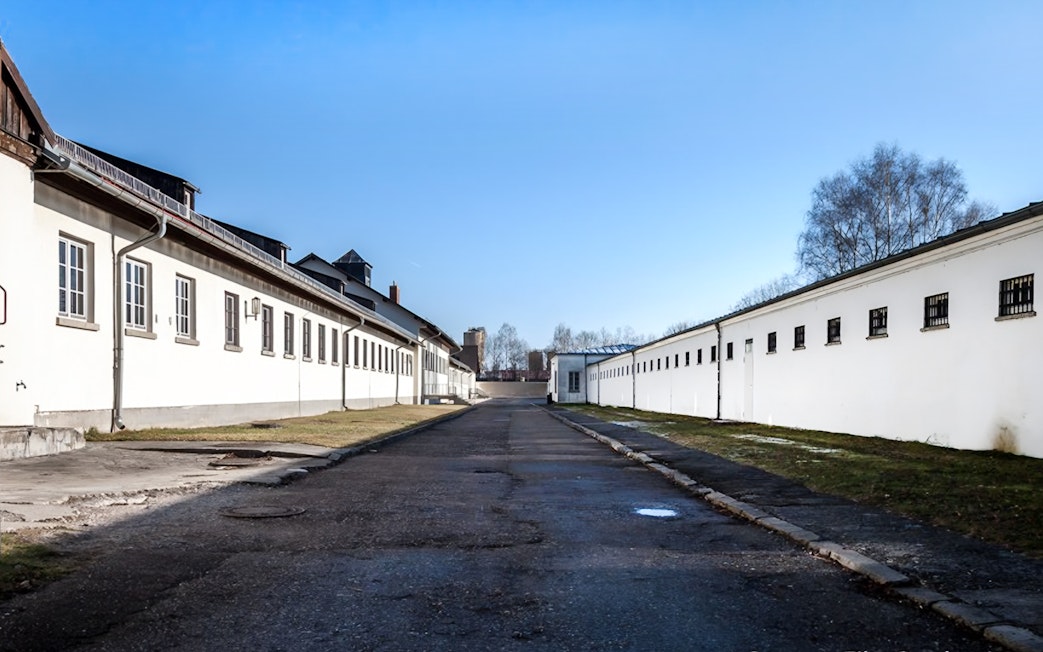 Dachau Concentration Camp buildings and pathway on guided tour from Munich.