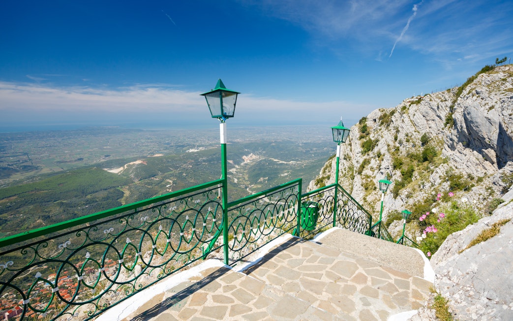 View from Sari Saltik, Kuja, Albania overlooking landscape and mountains.