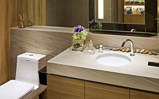 Luxurious bathroom at Plaza Premium First lounge, featuring elegant decor and amenities.