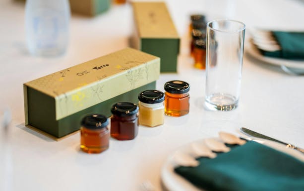 Samples of honey in small jars at A Taste of the Hive, Expo City Dubai.