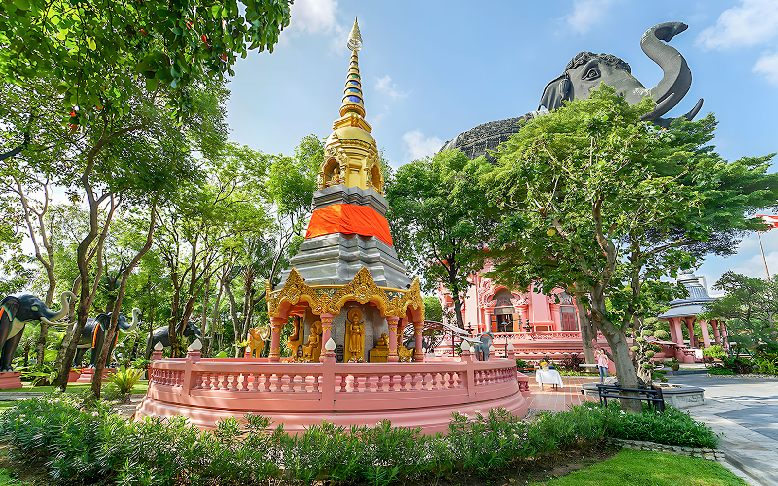 Erawan Museum's three-headed elephant statue and ornate stupa in Bangkok's Ancient City.