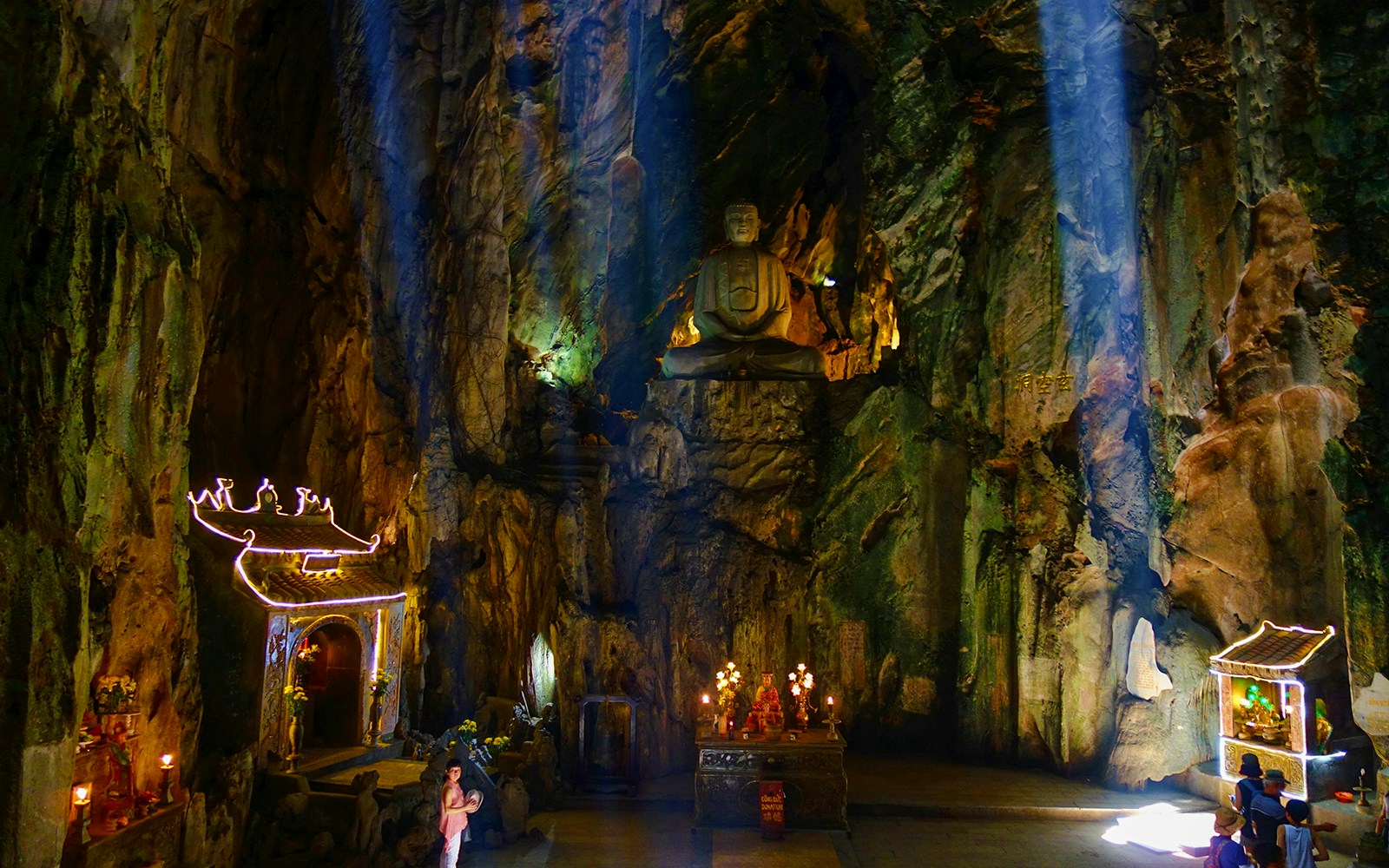 Buddha statue and altar inside Huyen Khong Cave, Marble Mountains, Da Nang, Vietnam.