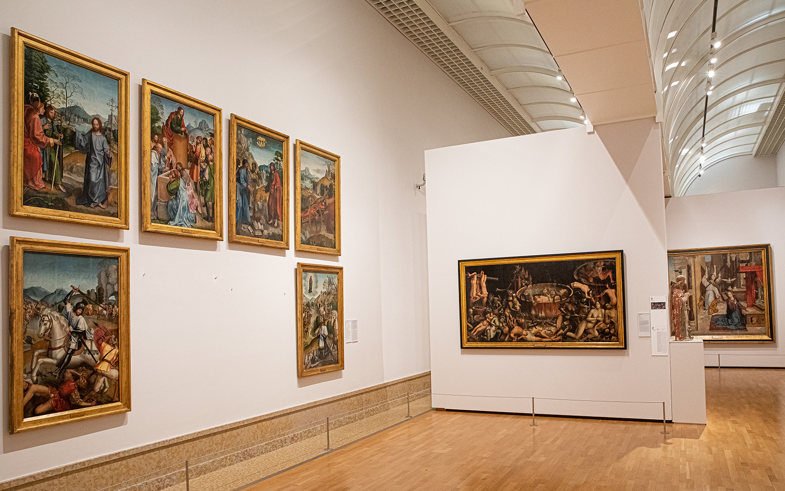 Paintings displayed in a gallery at the National Museum of Ancient Art.