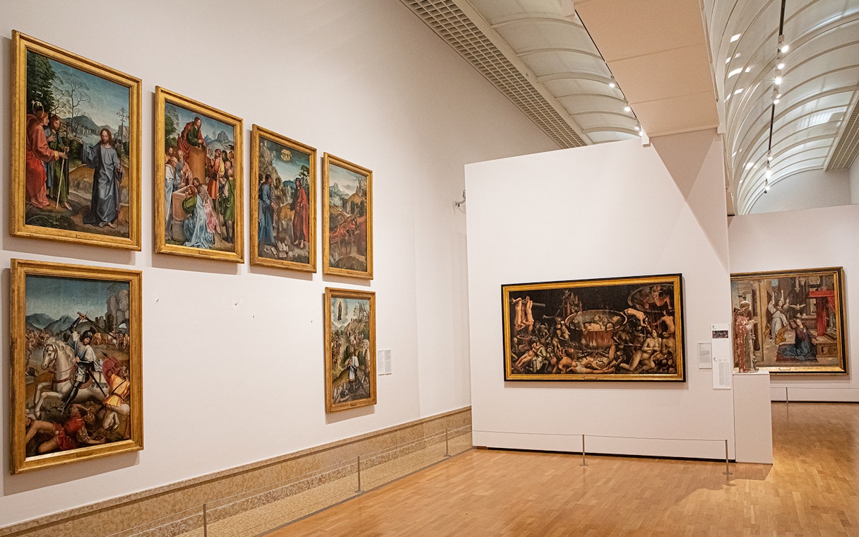 Paintings displayed in a gallery at the National Museum of Ancient Art.