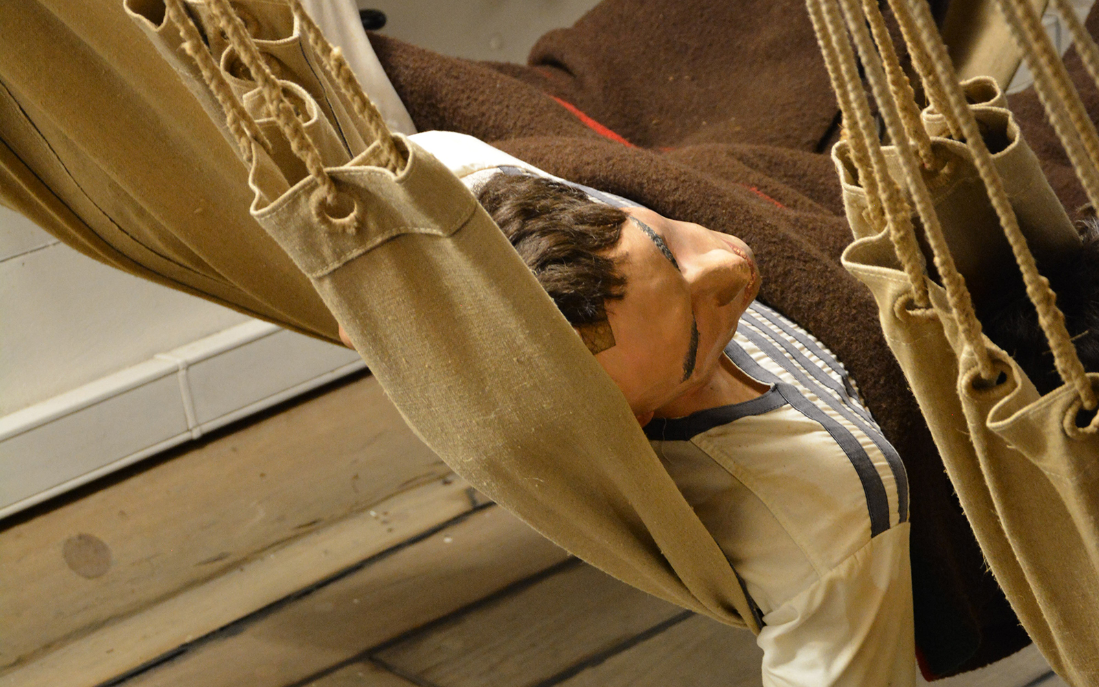 Crew member mannequin in hammock on Frigate D. Fernando II e Glória.