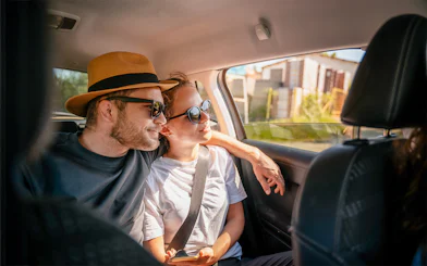 Couple enjoying private car transfer from Marrakech Airport RAK.