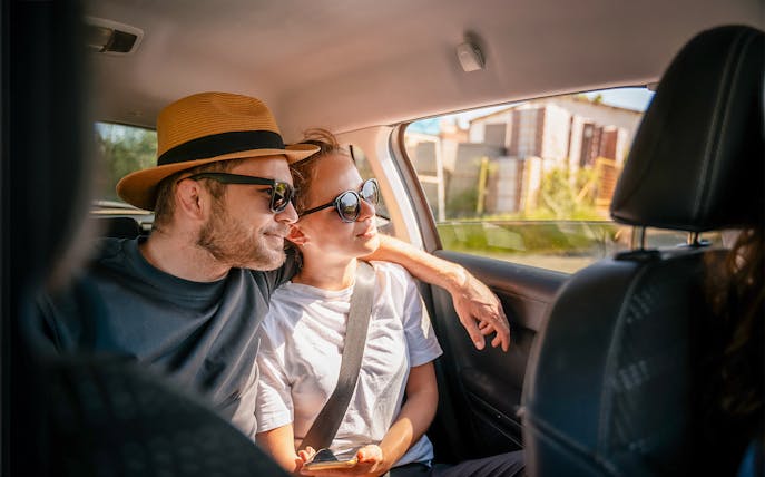 Couple enjoying private car transfer from Marrakech Airport RAK.