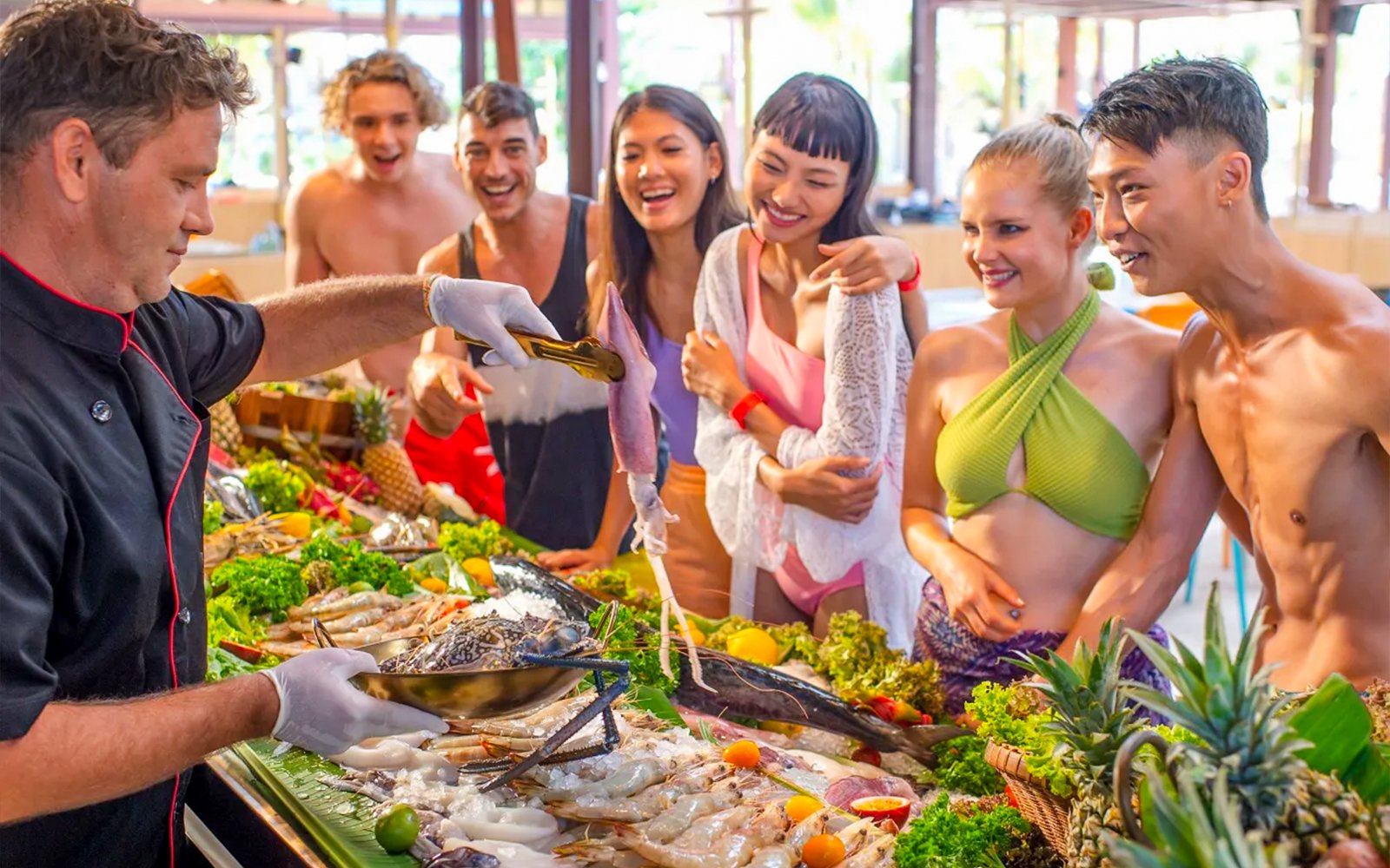Chef preparing seafood for guests at Andamanda Phuket Water Park.
