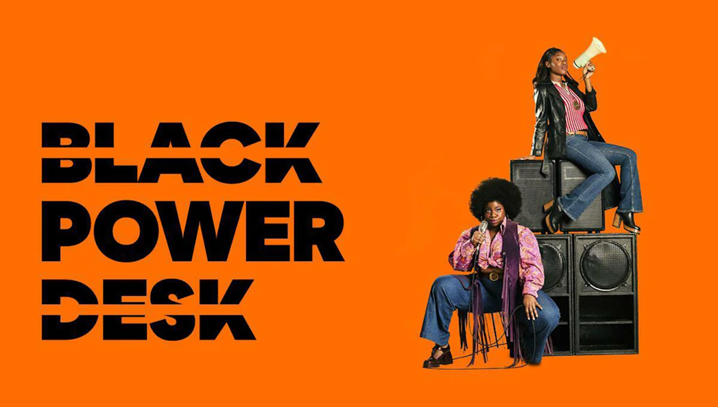 Two people with microphones and speakers, representing Black Power Desk.