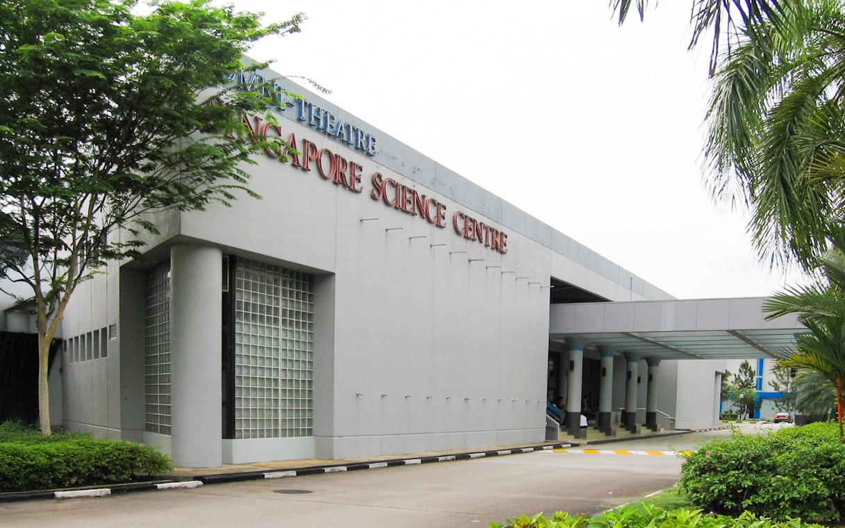 Singapore Science Centre entrance with surrounding greenery.