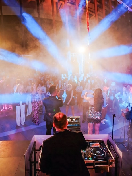 DJ and live band performing at Music Night, Sky Garden London, with a vibrant crowd.