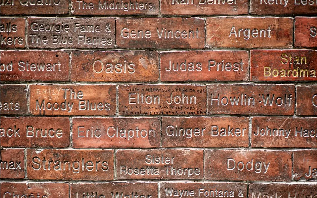 Cavern Club Wall of Fame bricks with musician names, Liverpool.