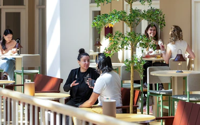 Visitors dining at a restaurant in The National Museum of Denmark.