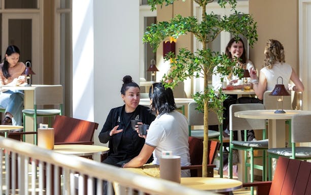 Visitors dining at a restaurant in The National Museum of Denmark.