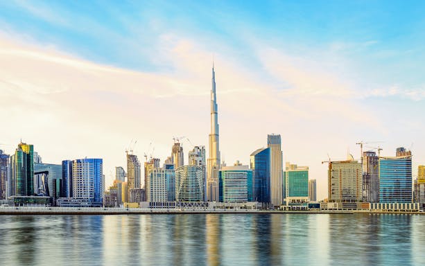 Dubai skyline with Burj Khalifa viewed from the water, part of the Pirate Ship Sightseeing Dhow Cruise.
