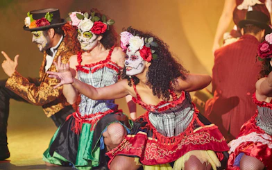 Performers in Day of the Dead costumes at PortAventura Park Halloween event.