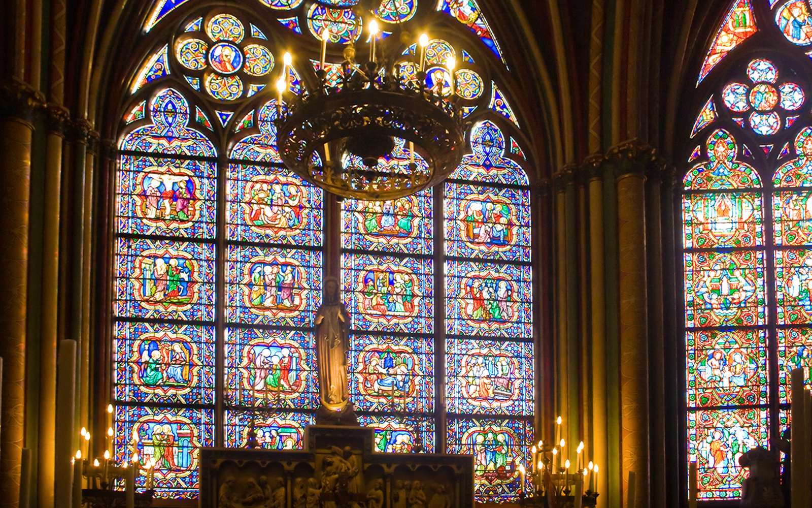 Notre Dame Cathedral in Paris with intricate Gothic architecture and iconic twin towers.