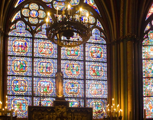 Notre Dame Cathedral in Paris with intricate Gothic architecture and iconic twin towers.