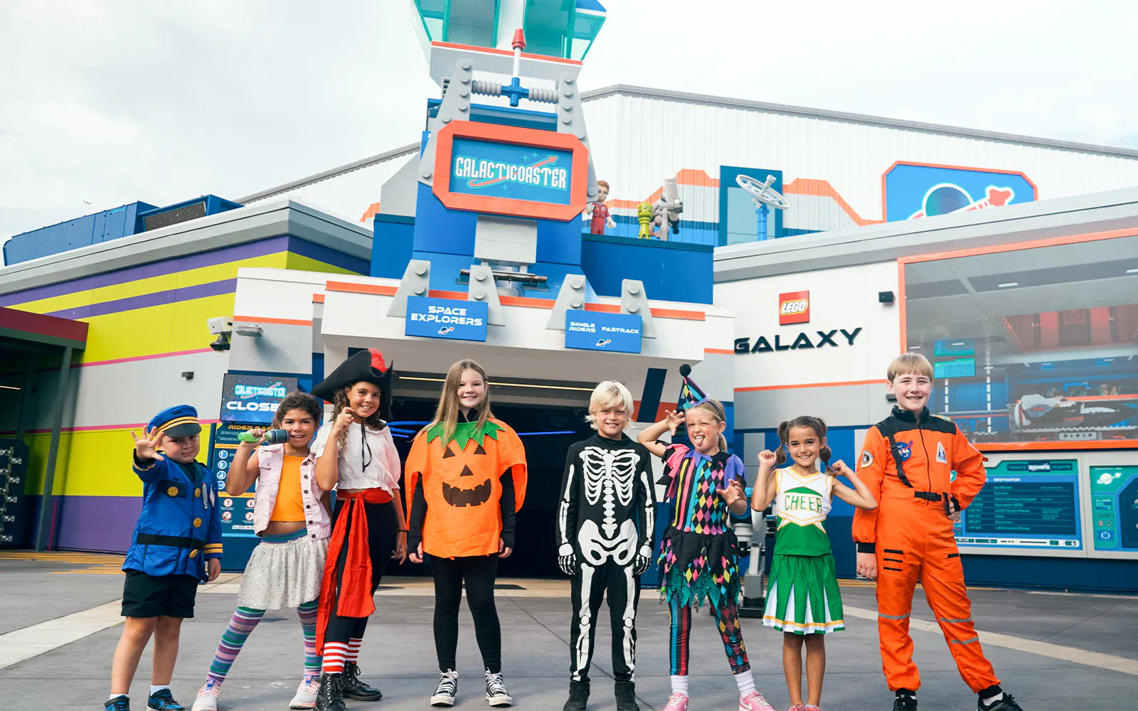 Children in costumes outside Galacticoaster at Brick or Treat, Legoland Florida.