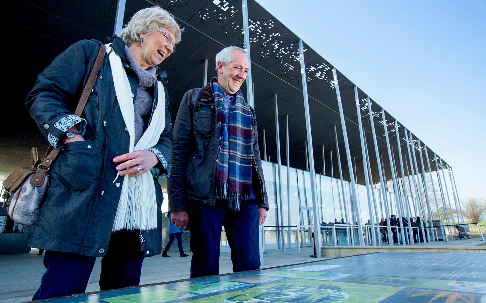 Visitors at Stonehenge visitor center during London to Stonehenge and Bath day trip.