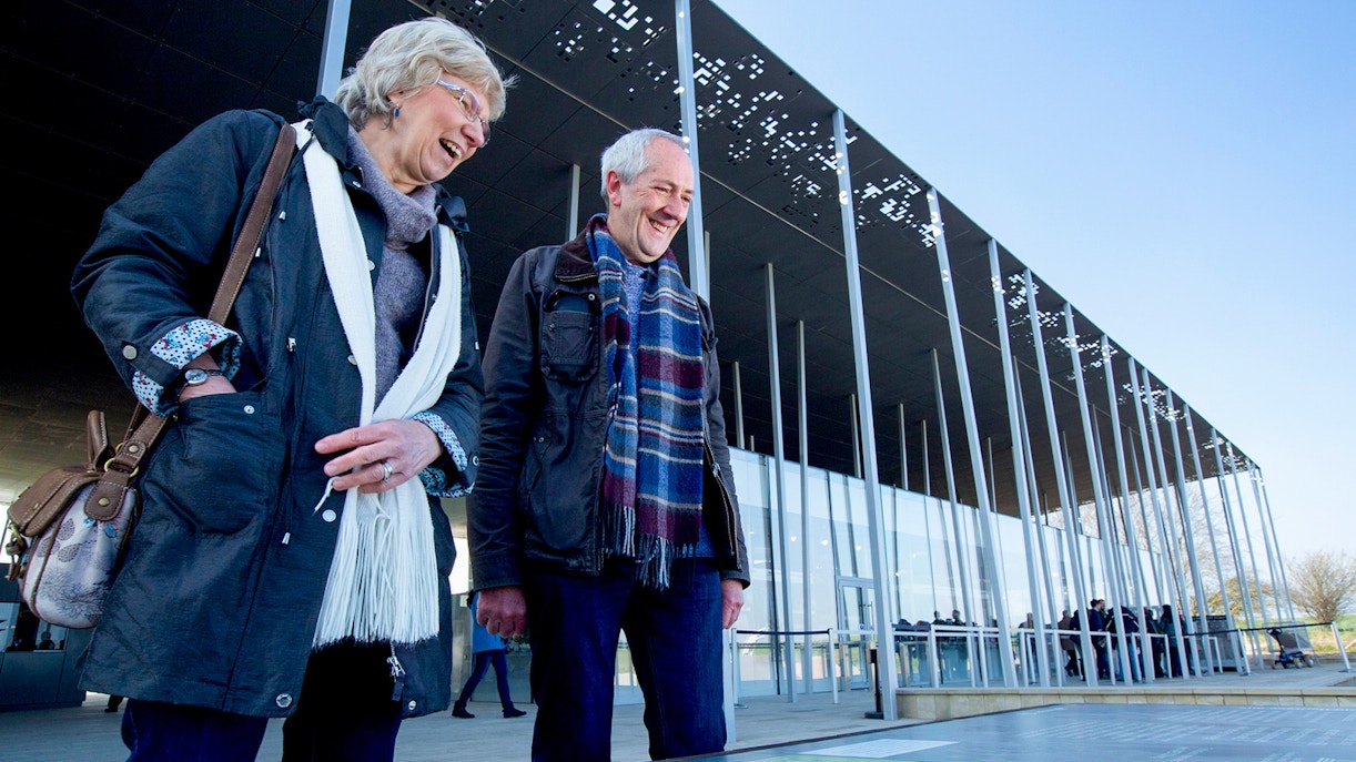 Visitors at Stonehenge visitor center during London to Stonehenge and Bath day trip.