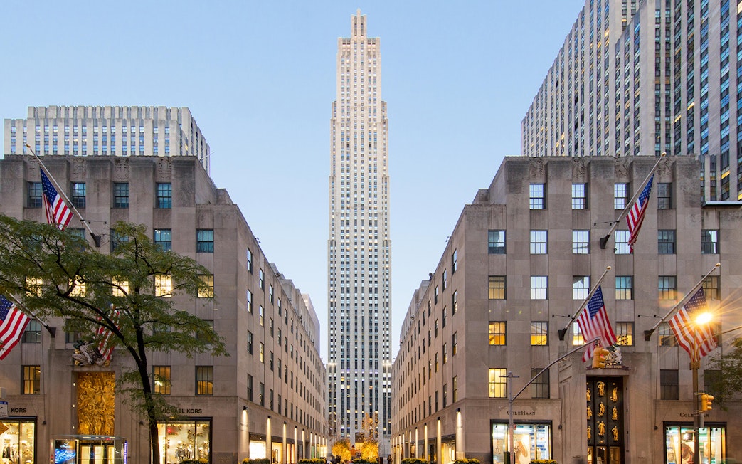 Rockefeller Center with flags and skyscraper, New York City.