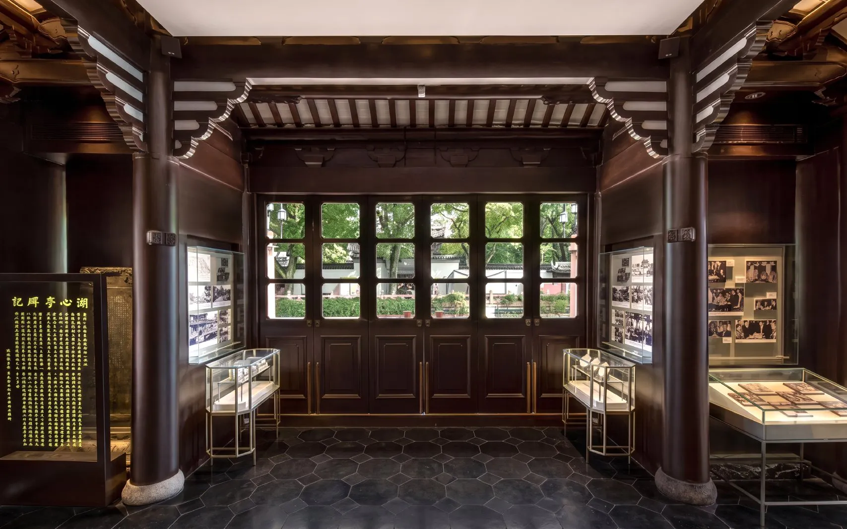 Interior of Huxinting Teahouse with display cases and traditional decor, Yu Garden, Shanghai.