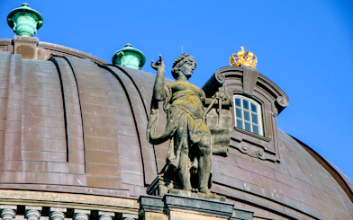 Statue atop Bode Museum dome in Berlin, Germany.