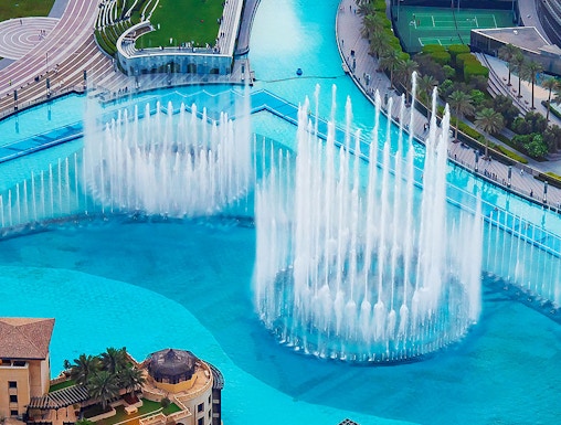 Dubai Fountain aerial view with water jets near Burj Khalifa, Dubai.