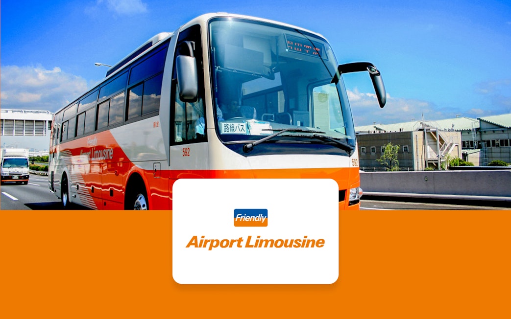 Tokyo Airport Limousine Bus on highway with cityscape background.