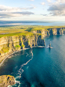 Cliffs of Moher in Ireland with ocean view and rugged coastline.