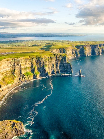 Cliffs of Moher in Ireland with ocean view and rugged coastline.