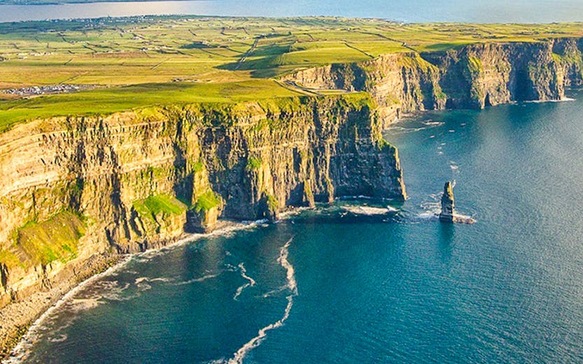 Cliffs of Moher in Ireland with ocean view and rugged coastline.
