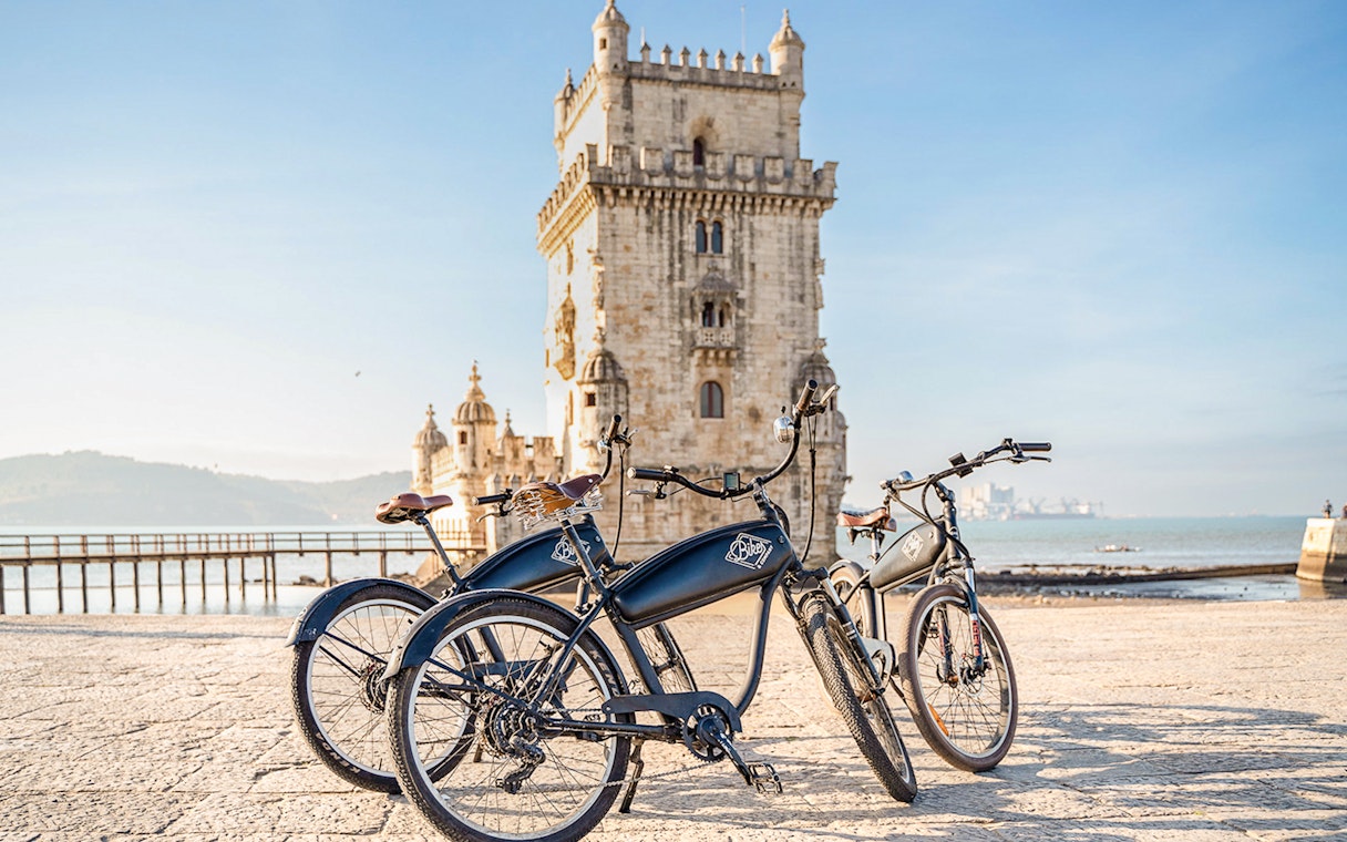 E-bikes parked near Belém Tower in Lisbon, Portugal.