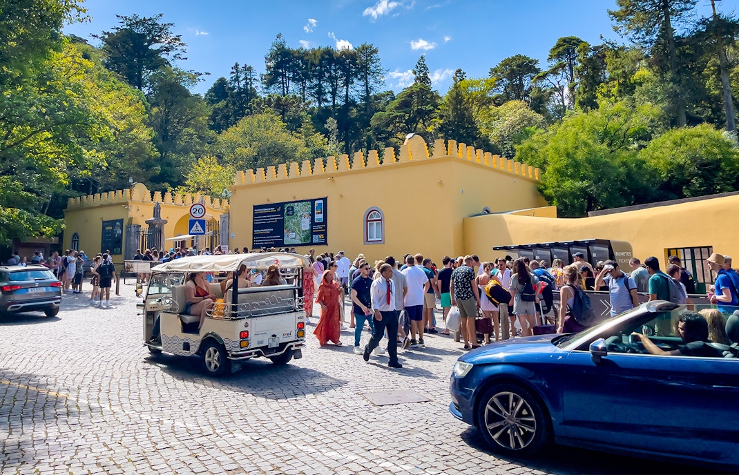 Sintra National Palace parking area with cars, Portugal.