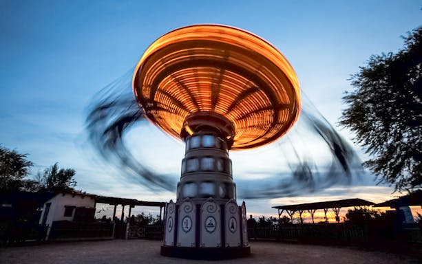 Spinning ride at sunset in Sendaviva Natural Park, Spain.