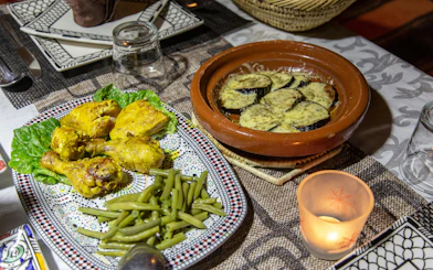 Chicken and green beans with eggplant tagine at desert camp dinner.