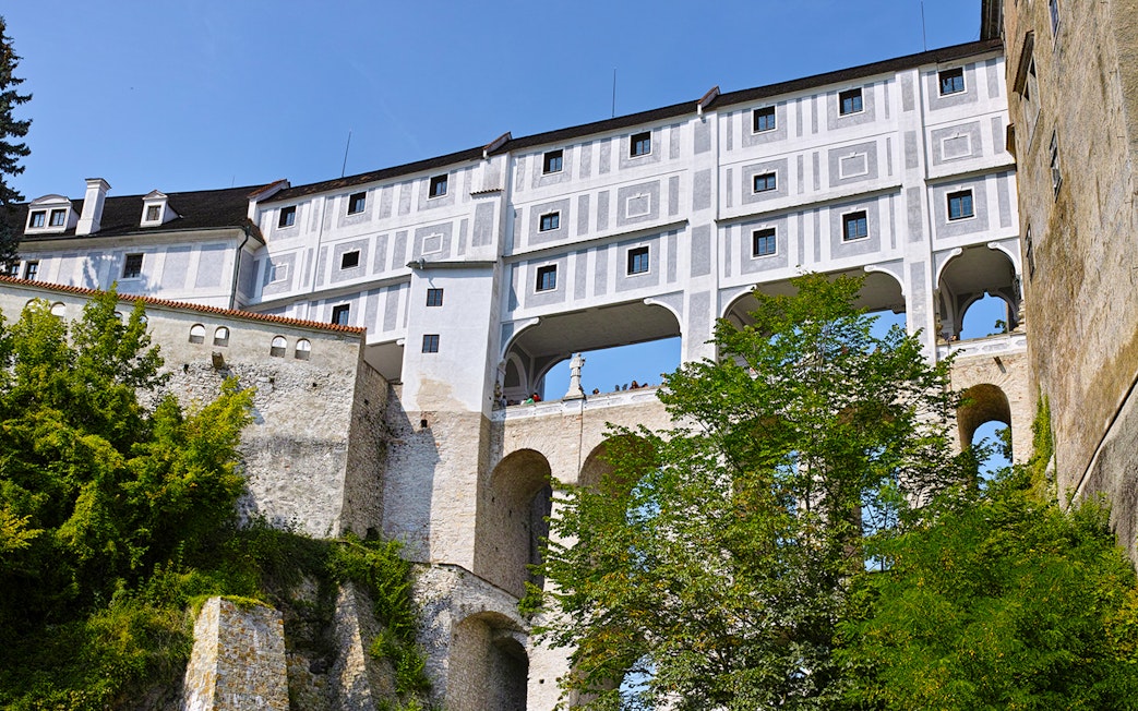 Cloak Bridge arches and facade in Cesky Krumlov, Czech Republic.
