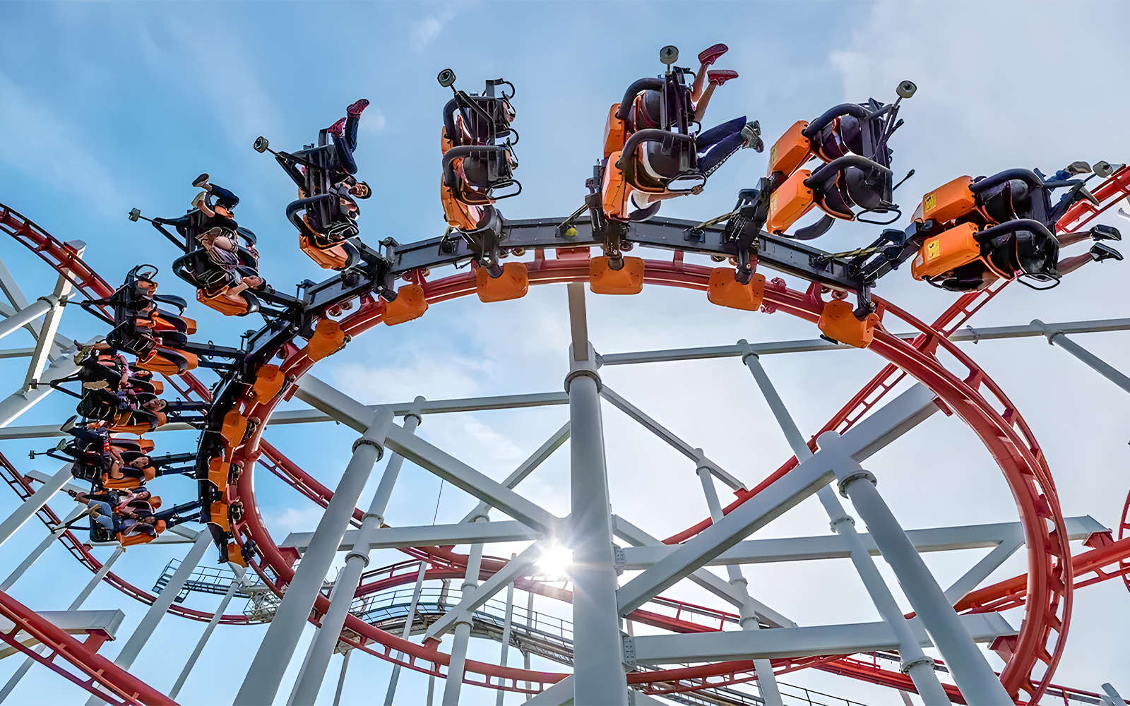 Roller coaster loop at Dream World Bangkok with riders upside down.