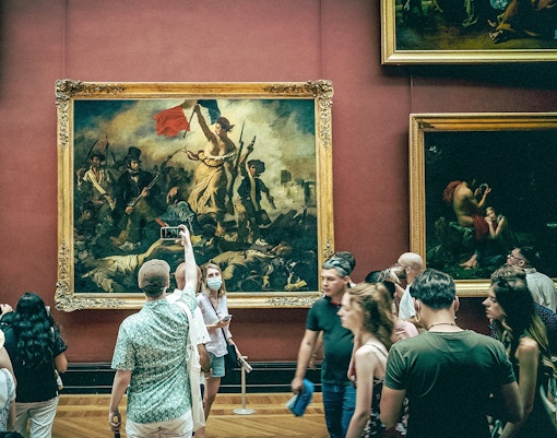 Liberty Leading the People painting by Eugène Delacroix displayed at the Louvre Museum, Paris.
