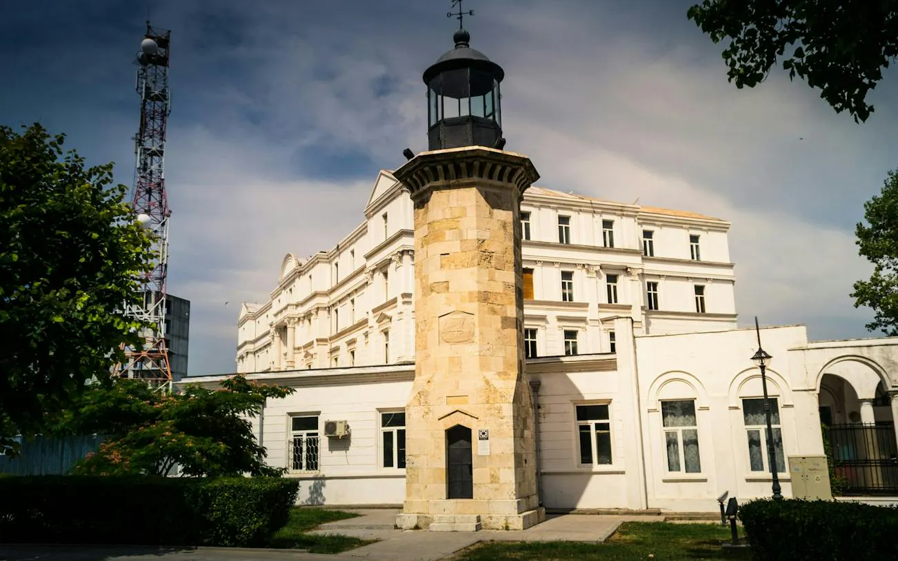 Constanta lighthouse and historic building on the Haunted Constanta Black Sea Monster tour.